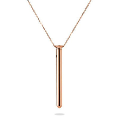 Rose gold stainless steel Vesper 2 vibrator necklace with a sleek pendant on a delicate chain.
