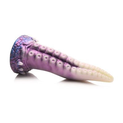 Purple and white silicone tentacle dildo with textured suckers and a suction cup base on a white background.