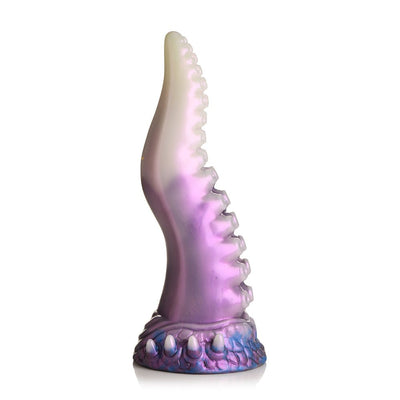 Pearl white and purple silicone tentacle-shaped adult toy with textured suckers and a wide suction cup base.