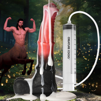 Peach and black centaur-themed dildo with ribbed shaft and suction base, connected to a syringe and hose for squirting fluids.