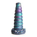 Iridescent teal, purple, and gold segmented fantasy silicone toy with textured base and suction cup for hands-free use.