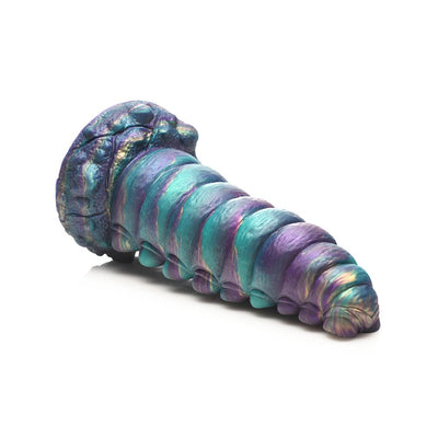 Iridescent teal, purple, and gold fantasy caterpillar-shaped silicone adult toy with textured segmented body and suction base.