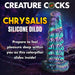 Iridescent teal, purple, and gold silicone fantasy dildo with segmented caterpillar-inspired texture and suction cup base.