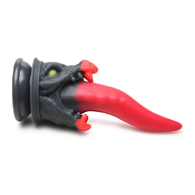 Red and black dragon-themed dildo with a long tapered tongue and suction cup base for hands-free use.