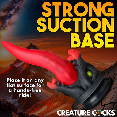 Red and black dragon-themed dildo with a long tapered tongue and strong suction cup base for hands-free use.