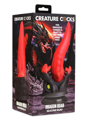 Packaging of Creature Cocks Dragon Roar silicone dildo featuring a red and black dragon-themed design with a long, tapered tongue shape.