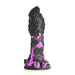 Black and purple textured fantasy dildo with ridges, spikes, and suction cup base for hands-free use and harness compatibility.