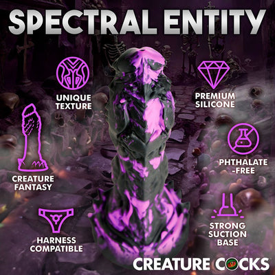 Purple and black textured fantasy dildo with strong suction base, highlighted features and a dark, eerie background with skeletons.