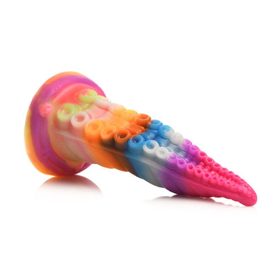 Rainbow-colored silicone tentacle toy with textured suckers and suction cup base on white background.