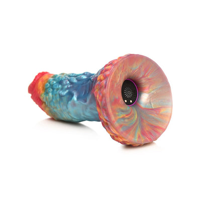 Rainbow-colored textured silicone dildo with suction cup base and embedded vibrator control, inspired by a phoenix design.