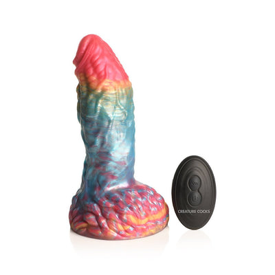Iridescent rainbow-colored textured silicone dildo with a wide suction base and black remote control on white background.