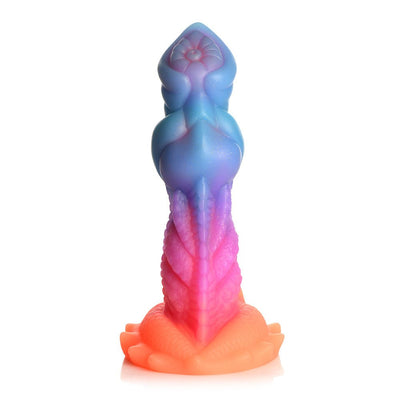 Colorful silicone dildo with textured ridges and suction cup base in blue, purple, pink, and orange gradient design.