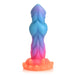 Colorful silicone fantasy dildo with textured ridges and suction cup base in blue, purple, and orange gradient hues.