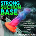 Colorful textured silicone dildo with strong suction cup base shown on a boat deck with stormy ocean background.