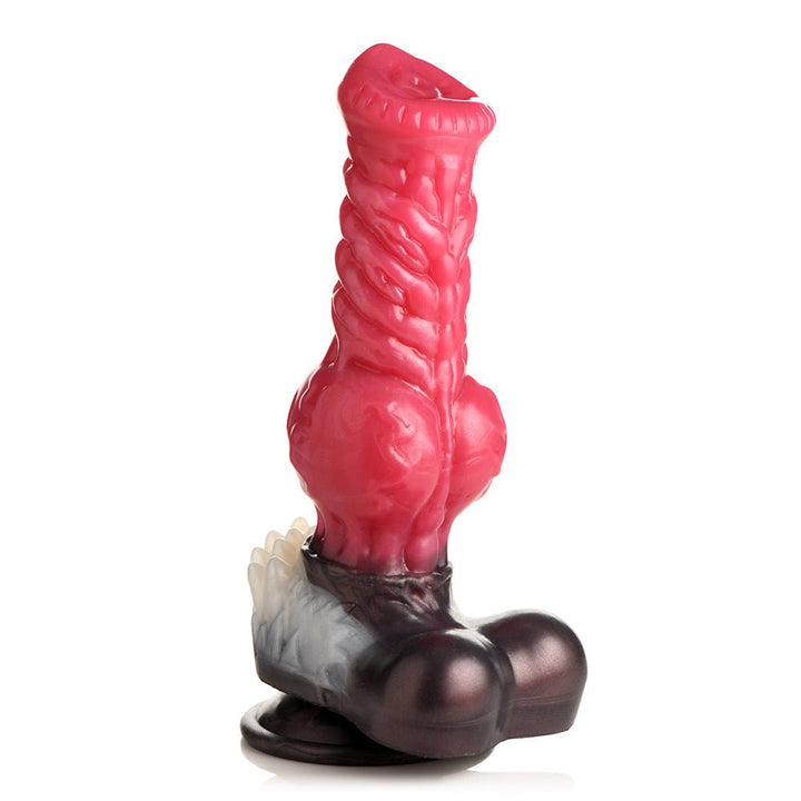 Large red and black canine-inspired silicone dildo with textured shaft, knot detail, white fur tuft, and suction cup base.