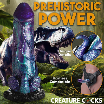 Glittery blue and purple dinosaur-themed dildo with suction base, detailed texture, and harness compatibility shown in forest setting.