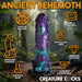 Colorful blue and purple dinosaur-themed silicone dildo with suction base, unique texture, and harness compatibility in a jungle setting.