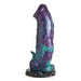 Blue and purple glittery dinosaur-themed silicone dildo with textured shaft and suction cup base.
