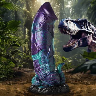 Blue and purple glittery dinosaur-themed silicone dildo with textured base and tail in a jungle setting.