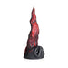 Red and black textured silicone fantasy dildo shaped like a dragon's tongue with a wide suction cup base.