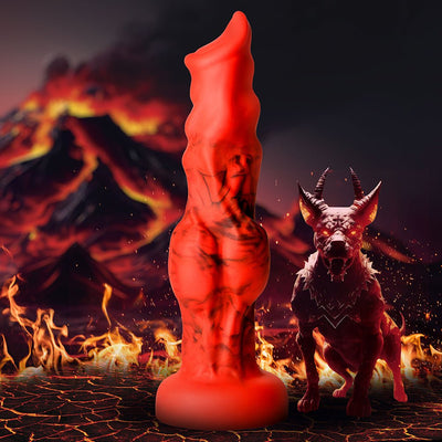 Red and black marbled silicone fantasy dildo with textured bulges and suction base, shown with fiery volcanic background and demon hound figure.