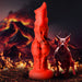 Red and black marbled silicone fantasy dildo with textured bulges and suction base, shown with fiery volcanic background and demon hound figure.