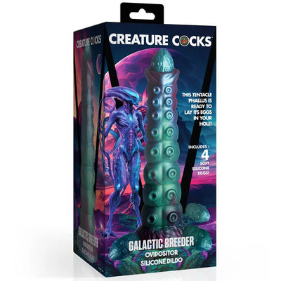 Packaging of Creature Cocks Galactic Breeder ovipositor silicone dildo with alien tentacle design and four soft silicone eggs.
