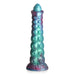 Iridescent teal, blue, and red textured ovipositor dildo with segmented shaft and wide base for harness compatibility.