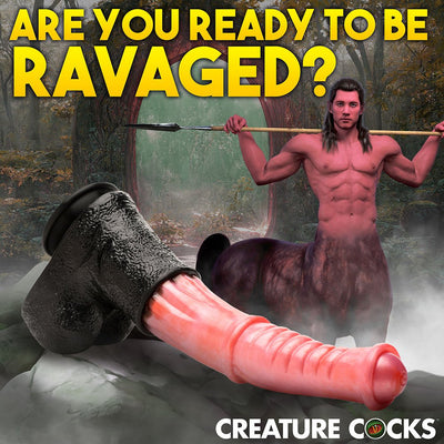 Fantasy centaur-themed dildo with peach shaft and black suction base, set against a forest background with a centaur figure.