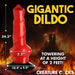 Red and black 2-foot tall fantasy-themed dildo with suction cup base and detailed texture against fiery background.