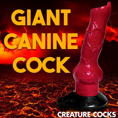 Red and black silicone canine-inspired dildo with suction cup base against fiery lava background.