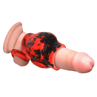 Red and black silicone girth enhancer sleeve with ball strap on a realistic penis model.