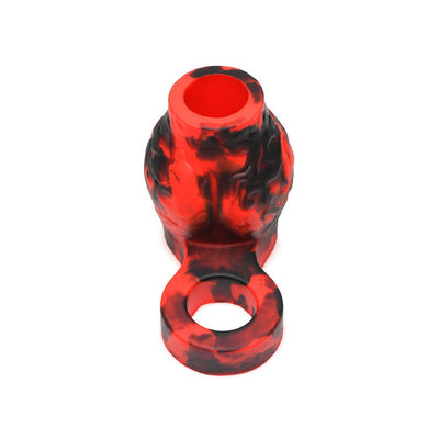 Red and black silicone girth enhancer sleeve with textured canine knots and attached ball strap.