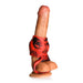 Realistic dildo with red and black silicone girth enhancer and ball strap for added thickness and sensation.