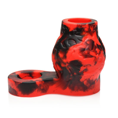 Red and black marbled silicone girth enhancer with attached ball strap and textured bulges at the base.