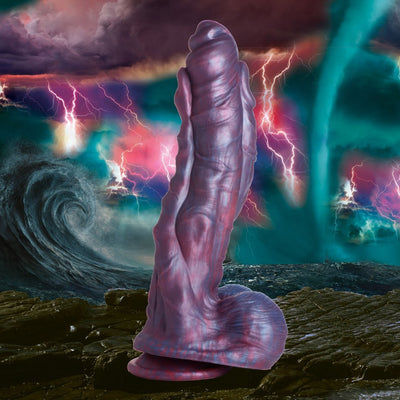 Hydra sea monster dildo in swirling red, blue, and purple with textured three-headed design and suction cup base.