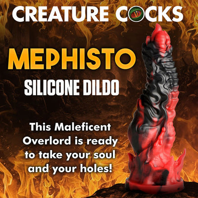 Red and black textured Mephisto silicone dildo with ridges and flame-like details on a fiery background.