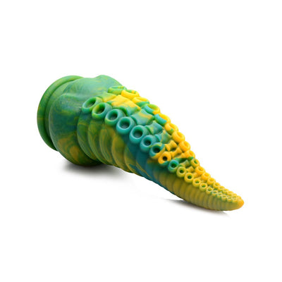 Green, yellow, and blue marbled silicone tentacle-shaped dildo with textured suction cup base on white background.