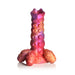 Sunset-colored silicone ovipositor dildo with textured ribs and four detachable egg-shaped inserts on a flared base.