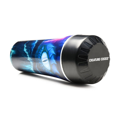 Blue sea creature themed stroker with black cap labeled Creature Cocks, lying on its side on a white background.