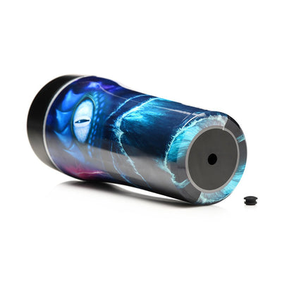 Blue sea monster themed stroker with black base and removable silicone plug on white background.