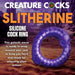 Purple silicone cock ring shaped like a spiked, toothy alien worm against a desert sci-fi background.