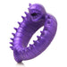 Purple silicone cock ring shaped like a spiked, segmented worm with a toothed mouth detail.