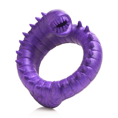 Purple silicone cock ring designed as a spiked, segmented worm with a toothy open mouth detail.