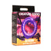 Purple silicone Slitherine cock ring with textured, spiked design on desert storm-themed packaging.