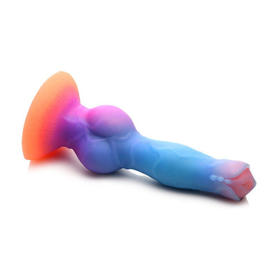 Colorful silicone alien-themed dildo with glow-in-the-dark glitter and suction base for hands-free use.