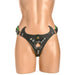 Black and green creature-themed strap-on harness with eye detail and adjustable buckles on a mannequin.