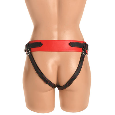 Back view of Creature Cocks Strap-On Harness in red and black vegan leather on a mannequin.