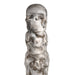 White and gray silicone dildo shaped as a vertical tower of detailed skulls with smoky shading effects.