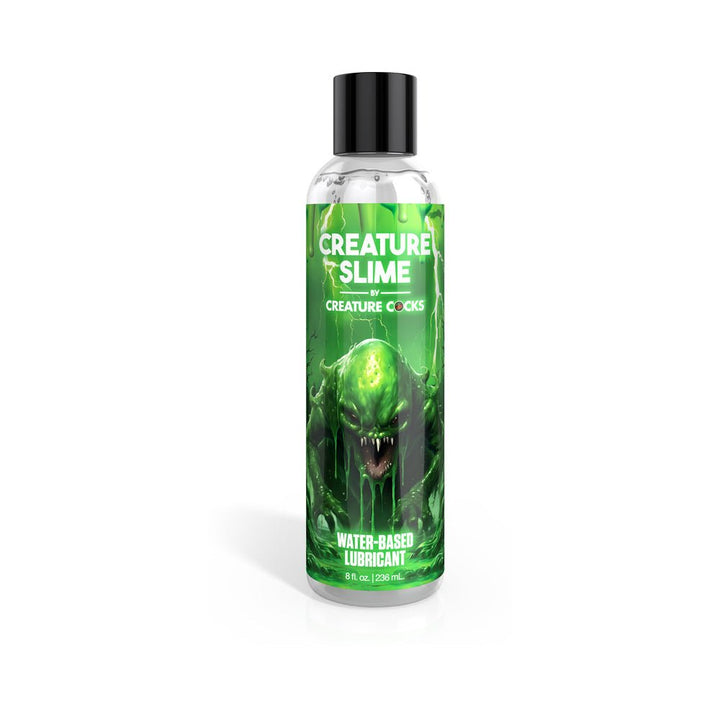 Clear bottle of Creature Slime water-based lubricant with green monster-themed label and black cap, 8 fl oz size.